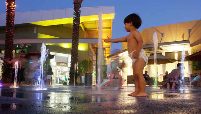 42. Splashdown | There are many times when we've looked longingly at the kids playing in the outdoor water fountains in the center of Tempe Marketplace, soaked from head to toe, not caring if it were 91, 101 or 111 degrees. Usually, the grown-ups all stand off to the side, holding shopping bags or the kids' shoes. So let this be your strategy: Don't wear good clothes. Don't dress for the movie theater or the bookstore or the restaurants; dress for the water fountain: shorts, T-shirt, flip-flops. Then enjoy. Just don't leave your cellphone in your back pocket. | Details: Tempe Marketplace, Loop 202 and McClintock Drive.