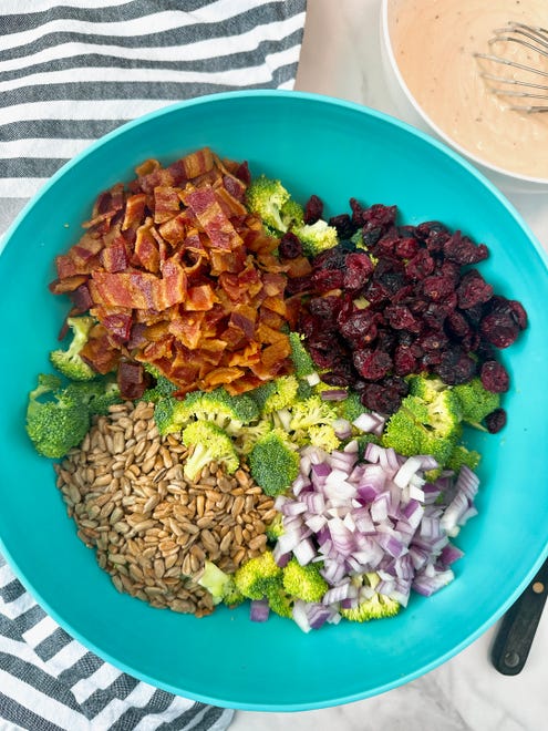 Broccoli salad is sweet and savory thanks to bacon and dried fruit.