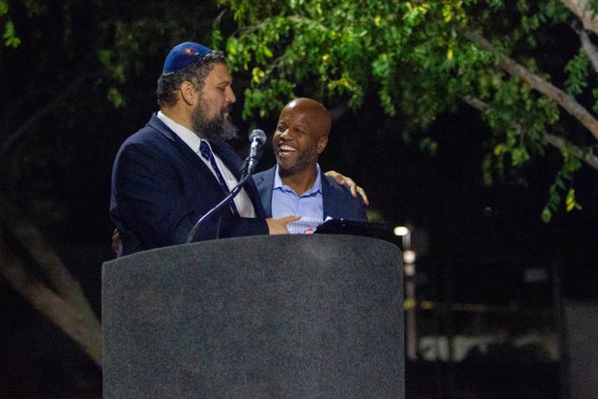 Rabbi Shmuel Tiechtel introduces Tempe Mayor Corey Woods at downtown Tempe's Menorah lightning on Dec. 7, 2023.
